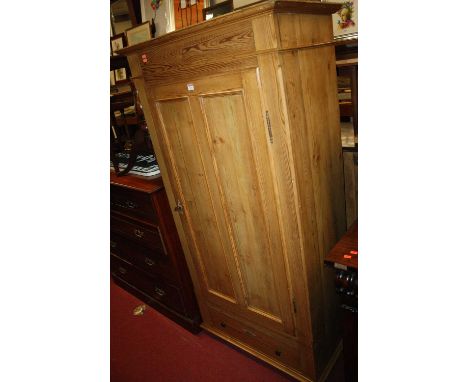 A French pine single door armoire, having single lower drawer, width 86cmSplits to both panel doors.Split to right side panel