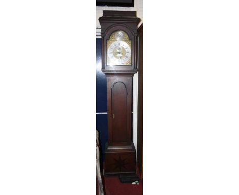 Richard Rayment of Bury (St Edmunds) (c1686-1754) - a mid 18th century oak longcase clock, having a 12" arched brass dial, ca