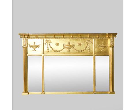 A REGENCY DESIGN GILTWOOD TRIPLE OVERMANTEL. With bevelled plates and urn and swag decoration71cm H x 111cm W.