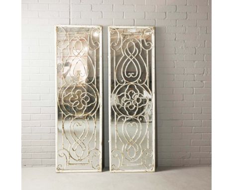 ARCHITECTURAL GARDEN WALL MIRRORS. a pair, in the Regency style, white painted metal frames, 162.5cm x 51cm approx. (2).