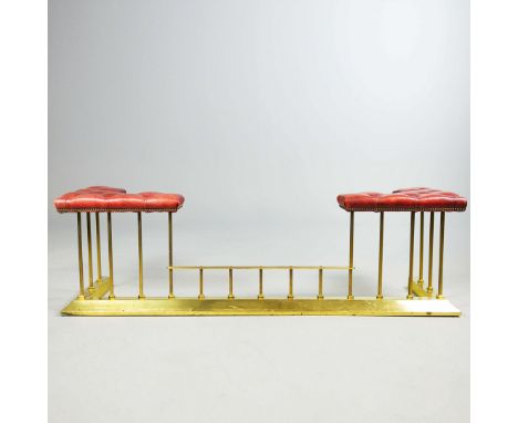 BRASS CLUB FENDER. scarlet leather upholstered, 52cm H x 176cm W x 50cm D, internal 136cm W x 30cm D.