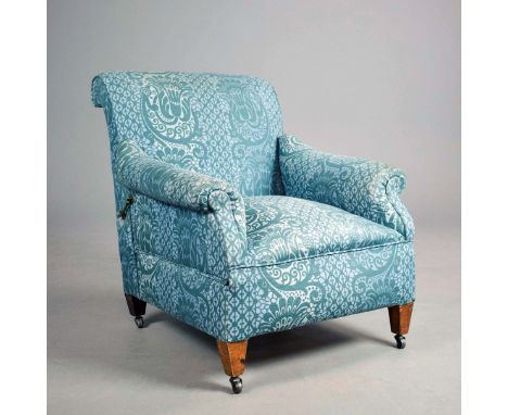EDWARDIAN RECLINING ARMCHAIR/DAYBED. circa 1900 with adjustable back and convertible seat, in patterned blue fabric on steel 