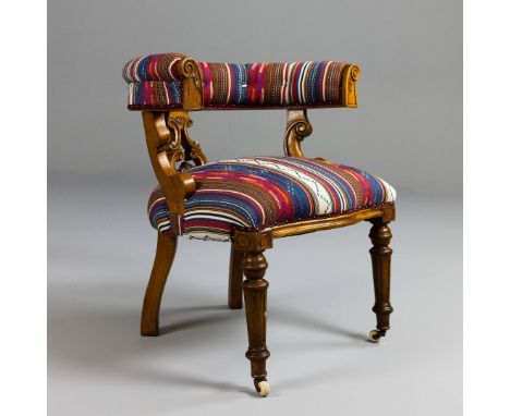 VICTORIAN OAK DESK CHAIR. Striped fabric with ceramic front castors, 78cm H x 74cm W x 67cm D.