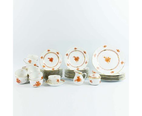 A HEREND 'APPONYI' PART DINNER SERVICE. hand painted in iron red, comprising six dinner plates, twelve breakfast plates, elev