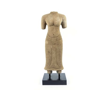 A CAMBODIAN KHMER SANDSTONE STATUE. torso of a female deity on black stand. 60cm H.