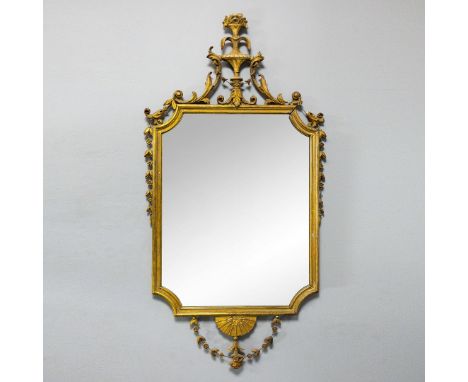 WALL MIRROR. gilt frame with an urn surmount and decorative floral detail 120cm t x 62cm w.