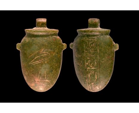 New Kingdom, Ramesside Period, 19th-20th Dynasty, 1292-1069 BC. A green schist heart amulet, Ib, with jar-shaped body, small 