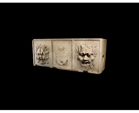 17th century AD. A marble ornamental garden water trough recalling classical sarcophagi, with segmented frontal face, grotesq