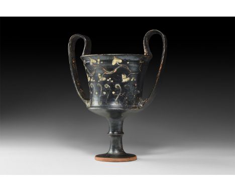 South Italian, 5th-4th century BC. A black-glaze kantharos with bell-shaped body, sharply carinated to the bottom and flared 