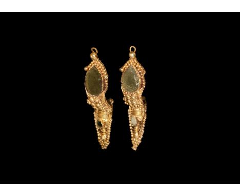 1st-2nd century AD. A matched pair of East Roman gold earrings each a large piriform cell with inset green glass cloison, bor