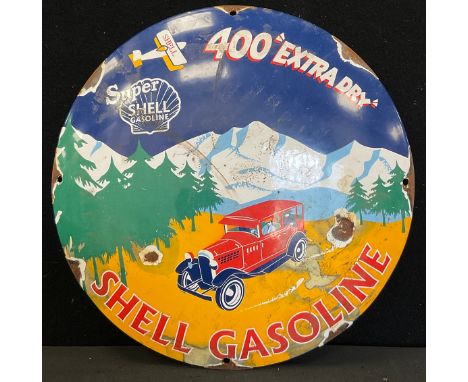 A reproduction enamel Shell Gasoline sign, 29cm dia 