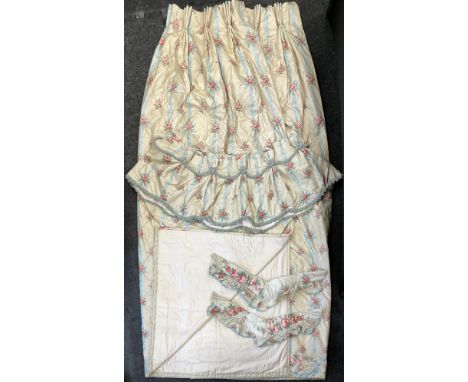A large pair of pink Rose Chintz and blue ribbon pattern interlined and weighted curtains, goblet headed pelmets, two tie bac