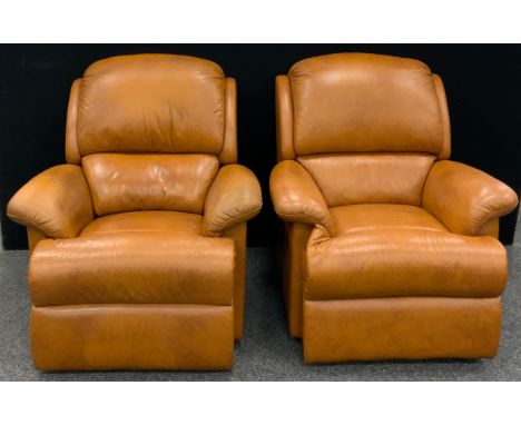 A pair of tan leather armchairs, by Sherbourne, one a manual recliner chair, (2). 