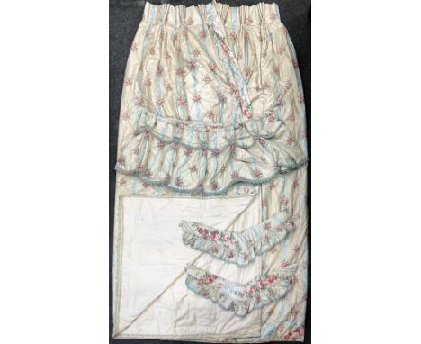 A large pair of pink Rose Chintz and blue ribbon pattern interlined and weighted curtains,  goblet headed pelmets,  possibly 