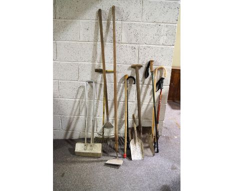 A collection of tools and walking sticks