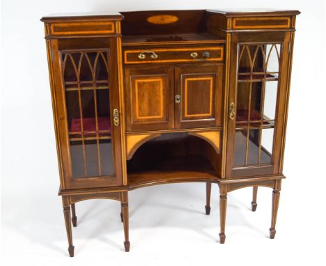 An early C 20th mahogany display cabinet with satinwood band inlay, with two glazed side cupboards, a central cupboard and a 