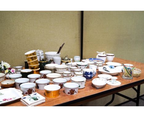 A collection of ceramics including ceramic flowers