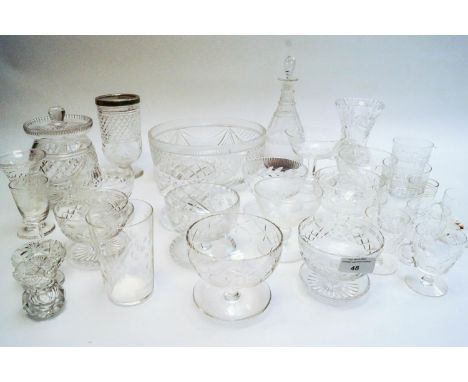 A collection of glass, including a vase and a decanter