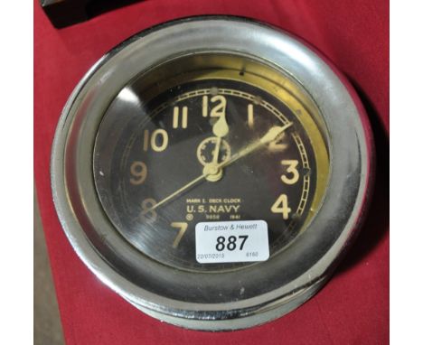 A Second World War US Navy ships bulkhead clock,
dated 1941, no. 9859, height 8".