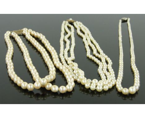 3 cultured pearl necklaces,
with 9ct clasps.