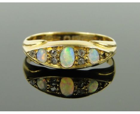 18ct gold opal and diamond ring, 
size L.