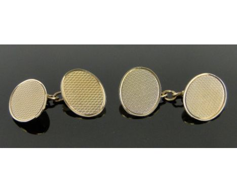 A pair of 9ct gold oval cufflinks,
6.5g total.