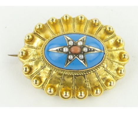 A Victorian oval unmarked gold hair pocket brooch,
with blue enamel, pearl and coral centre panel, 35mm across.