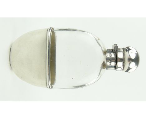 A Victorian Dunhill silver and cut-glass spirit flask,
London 1895, height 13cm.