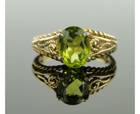 9ct gold green stone set ring, 
size N.