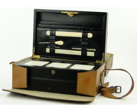 Vintage Aspreys leather travelling case
with inset brass handle and fitted interior, length 18".