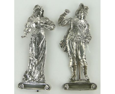 Pair of late Victorian cast silver menu card holders in the form of standing cavalier and lady,
makers marks B M, import mark