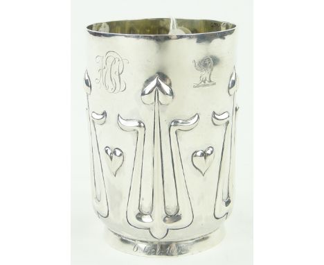 An Art Nouveau silver Christening mug,
with relief stylised designs, by Mappin Bros. Sheffield 1900, in original fitted leath