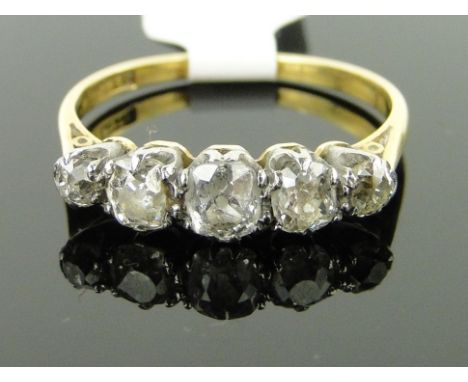 An 18ct gold 5-stone diamond ring,
size O.