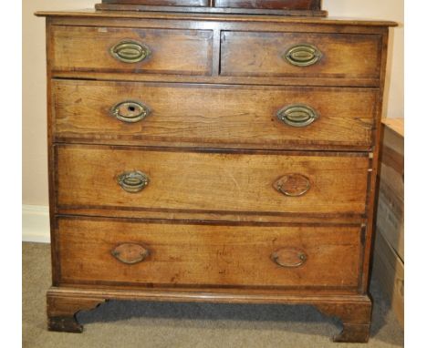 An 18th century oak chest,
having 2 short and 3 long crossbanded drawers raised on bracket feet, width 3'1", height 3', depth