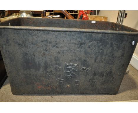 An early Victorian cast-iron military trough,
having the Board of Ordnance motif, a Stourbridge casting. Width 3'4", height 1