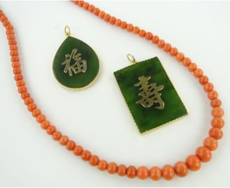 2 similar Chinese unmarked gold and jade pendants with text,
largest height 40mm and a Victorian coral bead necklace.