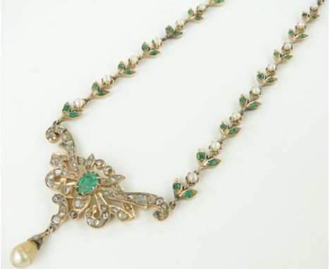 An ornate emerald and diamond necklace,
probably Indian origin circa 1880-1910, yellow gold settings with pearl pendant below