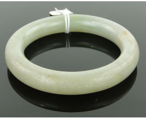 A Chinese jade bangle.