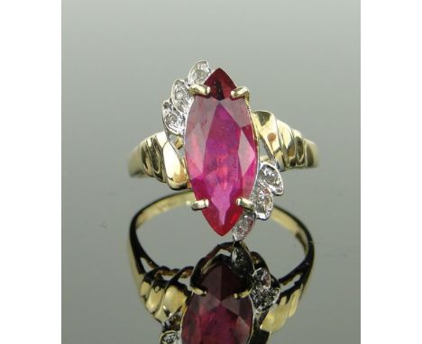 14ct gold marquise cut ruby and diamond cluster ring,
setting height 17mm, size M.