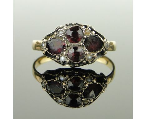 A garnet and pearl cluster ring,
unmarked gold settings, size P.