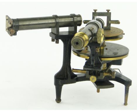 A Vintage theodolite 
with brass mounts by Griffin of London.