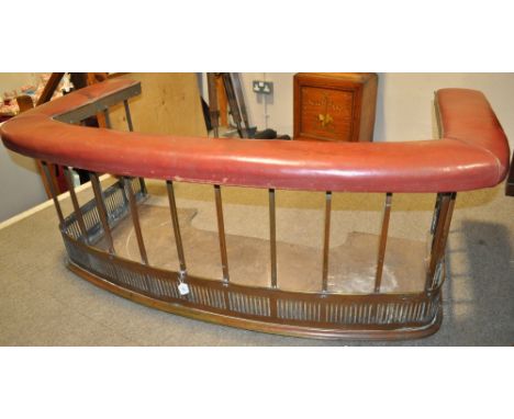 A Victorian brass and leather upholstered club fender,
width 5'2", depth 2'9", height 2'.