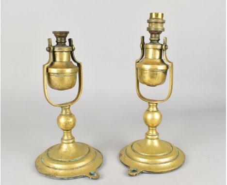 A Pair of Late 19th/Early 20th Century Weighted Gimballed Brass Oil Lamp Bases, One Now Converted to Electricity, Missing Bur
