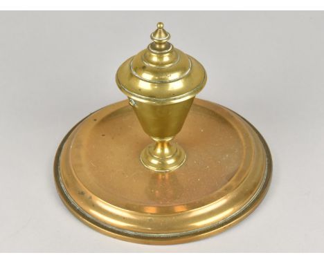 A Late Victorian Brass Desktop Ink Stand with Circular Tray Base, 18cms Diameter, Vase Shaped Inkwell missing Ceramic Liner