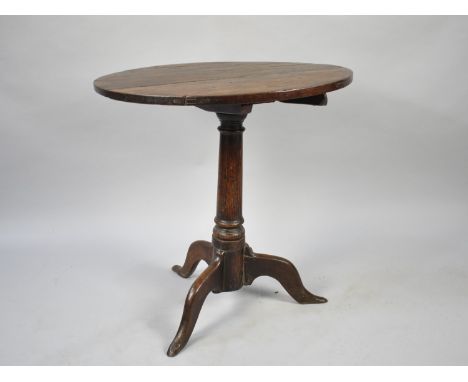 A 19th Century Circular Former Snap Top Tripod Table, 61cms Diameter