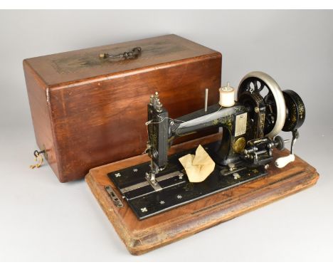 A Cased Frister and Rossman Manual Sewing Machine
