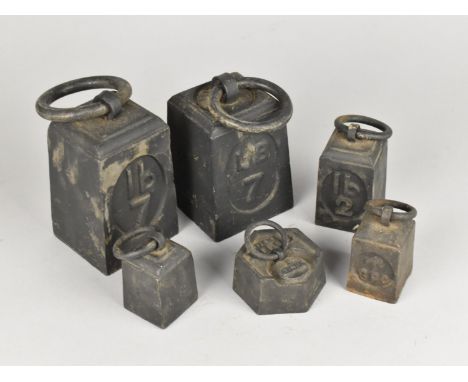 A Collection of Black Painted Cast Iron Vegetable Scale Weights