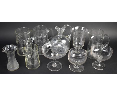 A Collection of Edwardian Glassware to include Celery Jar, Jugs, Flask Etc