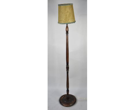 A Mid 20th Century Turned Standard Lamp with Unrelated Shade