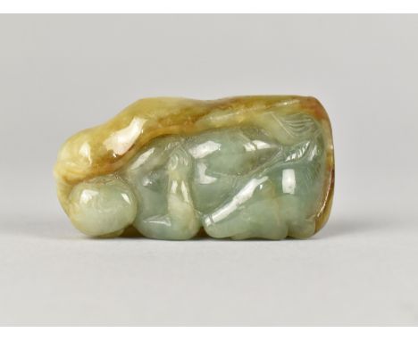 A Carved Jade Pebble depicting Chinese Elder, 5.5cms High